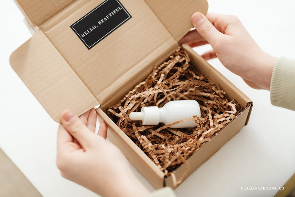 bottle inside the paper box